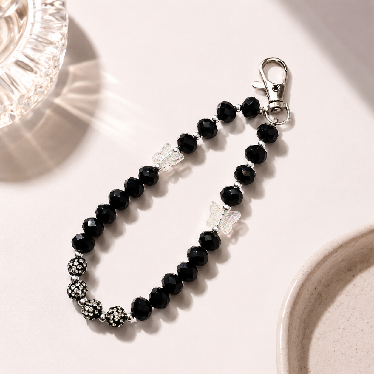 main img-1 Black & White Butterfly Beaded Phone Charm Wrist Strap for Women - Image 1